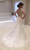 Sexy Off Shoulder Long Sleeves Lace Mermaid Wedding Dresses With Detachable Train Luxury Applique Beaded Dubai Bridal Gowns