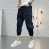 Jeans masculino Cool Men Nona calça com botão rasgado e zíper coreano Calças de cor sólida Roupas masculinas