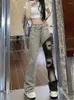 Calça jeans feminina 2023 Y2k com costura contrastante streetwear Harajuku rasgada cintura alta