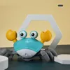 Elektroniska husdjur induktion fly crawling crab pedagogisk USB laddning krabba med musik led undvik hinder sensoriska rörliga leksaker för småbarn 230613