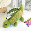 Creative petit dinosaure en peluche porte-crayon mignon dessin animé Animal enfants jouet stylo Kawaii sac d'école pendentif