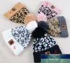 Cappello caldo lavorato a maglia autunnale e invernale Cappello a sfera in pelliccia con stampa leopardata Berretto con maniche in peluche in pelliccia di martora Classico da donna invernale