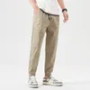 Мужские брюки oussyu бренд летняя хлопковая лодыжка.