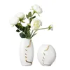 Vasen, Blumenarrangement, Keramikvase, abstraktes Gesicht, moderne, einfache, getrocknete Blumen, frisches Wohnzimmermodell, Wohnaccessoires