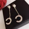 Luksusowe kolczyki z dwustronnymi dubonowymi kolczykami z frędzlami Srebrne Dangle Studs Charm Letter Ear Stud dla kobiet biżuteria ślubna