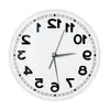Horloges de table de bureau Revese Numbers Insolite Run Backwards Horloge murale pour salon L'horloge dans le sens contraire des aiguilles d'une montre Sweep Sweep Wall Watch Home Decor 230614