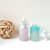 Garrafas de armazenamento YUXI Color Flat Shoulder Glass Bottle 30ml Dropper Vacuum Essence Essential Oil Skin Care Material.