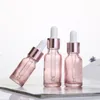 Kersenroze Glas Essentiële Olie Parfumflesje Vloeibaar Reagens Pipet Druppelflesjes met Rose Gouden Dop 10-50 ml Hjtlj