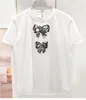 T-shirt da donna Design del marchio Paillettes Fiocco Bottone Bianco Casual T-shirt in cotone Slim O-Collo T-shirt moda coreana a maniche corte da donna 2023