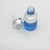 20 ml 30 ml Botella cuentagotas de vidrio de lujo Botellas de suero únicas azules con cubierta de plata especial Precio moderado Danfm