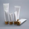 Botella de plástico blanco vacío Tubos exprimidores Frascos de crema cosmética Recipiente de bálsamo labial de viaje recargable con tapa de bambú Tgpwq