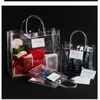 Gift Wrap 10pcs20pcslot PVC Transparent Gift Bags With Handles Clear Handbag With Button Party Favors Bag Wine Packaging Bags 230614