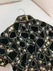 2023 Summer czarne złote cekiny Cheongsam Sukienka Kontrast Kolor krótkiego rękawa przyciski kołnierza Midi Sukienki J3L127516