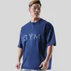 メンズTシャツジムTシャツメンコットンスポーツ半袖Tシャツ男性フィットネスルースワークアウトTシャツ夏のボディービル服230615