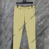 23SSウエスタン衣料品デザイナーメンズパンツブレザーミックススタイル秋のスリムフィットカジュアルグリッドジオメトリパッチワークプリント男性ファッションドレススーツ