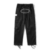 Mans broek Cargo heren streetwear bedrukte casual broek Militaire Retro Multi-pockets Rechte losse overalls Button Fly Paar trainingbroek met rechte pijpen 909