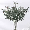 Torkade blommor konstgjorda olivfruktträdgrenar lämnar falsk växt för hemhotellbröllop bakgrund dekoration jularrangemang