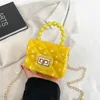 Ny laminerad Pearl Handbag Mini Chain Lingge Jelly Bag Change Children's Bag