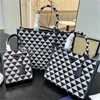 Bolsas de noite femininas 22SS livros Tote bolsa Desinger Sunmmber bolsas de praia nova bolsa de lona de luxo padrão triangular moda bolsa tiracolo ombro grande Satc J230615