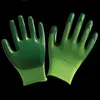 Les fabricants fournissent directement des gants de protection du travail masculin en latex de caoutchouc imprégné de nylon résistants à l'usure et antidérapants pour attraper le site de vente en gros de la mer