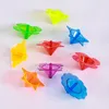 Spinning Top 100pcs Mini Tops Flashing Novelty Bulk Kids Spin Toys Party Favors Bundle Pack Colorful Plastic Gyroscopes Toy 230615