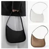 Raden Half Moon Bag Women's Spring and Summer Popular Design High Quality Kendou äkta läder Enkel axel underarm Bag