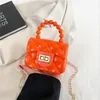 Ny laminerad Pearl Handbag Mini Chain Lingge Jelly Bag Change Children's Bag