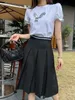 المصمم MIUI للسيدات القصيرة الطويلة التنانير الصيفية Girls Classic Tirt Tirp Top Mini Maxi Jaxi Trild Black A-Line Skirt Small Leather Dress