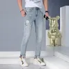 Hommes à la mode marque jean imprimé crâne bleu clair Denim pantalon Streetwear été mince petits pieds polyvalent coréen tendance homme pantalon 28-36