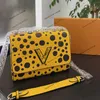 23ss kvinnor axelväska läder shopping väskor vita prickar handväska lyxiga designers tote shouder cross body väska med original metall fästelement handväska påse 23 cm