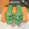 Designer Dam Reveal Platta Sandaler Mode Läder Gummitryck Läder Högkvalitativ Top Flip Flops Outdoor Beach Slide Sola Tofflor 35-40