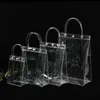 ギフトラップ1020PCSLOT透明ソフトPVCギフトトートパッケージバッグハンドループ付き透明なプラスチックハンドバッグ化粧品バッグ230614