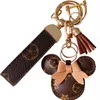 Porte-clés de voiture de mode faveur souris fleur sac sac à main pendentif breloque porte-clés marron pour hommes cadeau en cuir PU lanière porte-clés Acc198D