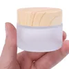 2021 Frasco de vidro fosco para cuidados com a pele Frascos para creme para os olhos Pote Frasco recarregável Recipiente cosmético com tampa de grão de madeira 5g 10g 15g 30g 50g