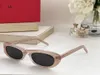 SL 557 Cat Eye Zonnebril van hoge kwaliteit voor vrouwenheren Designer Zonnebril Mode klassieke stijl Eyewear Retro Unisex Rijden Antiuv400 Ovale lens Lookgril PA 2024