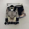 23ss vrouwen shorts sets vrouwen designer kleding waaiervormige print sexy perspectief zwaar werk bezaaid kralen revers shirt met lange mouwen A-lijn shorts Vrouwen kleding