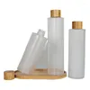 Bouteilles de stockage Couvercle en bois de bambou Frost Plastic Toner Bottle 200ML 250ML 300MLCosmetic Packaging Vide PET Rim 24mm Round Flacons rechargeables