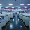 Production et vente de fil pur coton pour la filature à air