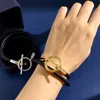 Catena di design di lusso di alta qualità Bracciale a 2 strati Argento color oro Tessuto Naso di maiale Fibbia Doppio anello Corda a mano in pelle Gioielli moda donna CIZY