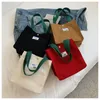 Novas bolsas de noite 23ss bolsas de lona marca de moda feminina ombro feminino armazenamento ambiental macio reutilizável grandes bolsas femininas para compras