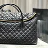 es quiltade läder resväska kvinnor keepall överdimensionerad sport tygkoppling bagagepåsar män lyxiga handväskor korsar kroppsväska designer duffle axel stora butikspåsar