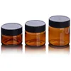 Quality Amber PET Plastic Jars Round Leak Proof Cosmetic Foods Containers Bottle with Black PP Lids & White Gasket 2oz 33oz 4oz Abvus
