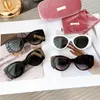 cat eye sunglasses miu glasses designer sunglasses women Elliptical sunglasses High end metal mu logo design Sexy charm Gathering focus size53 18 145 Brand glasses