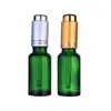 Botella cuentagotas de vidrio verde de 30ml, botella de loción con bomba de 1OZ, botella de Spray de vidrio de Perfume de aceite esencial, Color verde nuevo Oevtv