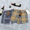 トップ通気性クイック乾燥プリント夏のデザイナービーチパンツメンズカジュアル汎用性のショートパンツM-XXXL