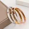 Gioielli con bracciale rigido in acciaio inossidabile smaltato verde rosso di lusso per regalo da donna