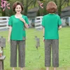 Calças femininas de duas peças 2023 conjunto de decote em O verão feminino vintage manga curta conjuntos de camiseta de meia-idade tamanho grande solto agasalho