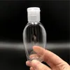 60 ml tom hand sanitisator Pet Plastic Bottle With Flip Top Cap transparent oval formad flaska för kosmetika Lotion Desinfektionsvatten MKVFA