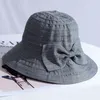 Berets HT3550 Spring Summer Hat Woman Solid Big Bow Busket Paknabka pakieta pakiet łowiska swobodne anty-UV szerokie brzeg słońca Panama