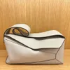 Designer Hobo Duffel Pochette Puzzle Handväska Lyxig äkta läder Tote axelväska Kvinnor Snabb sommarstrandväskor Mens Flip Clutch City Cross Body Baguette Väskor